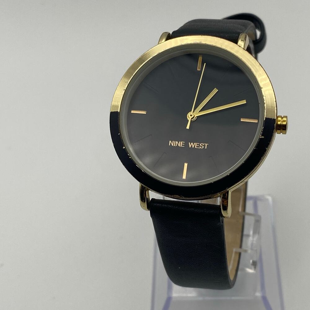 Elegant Nine West Women's Watch with Black Strap & Two-Tone Bezel New Battery